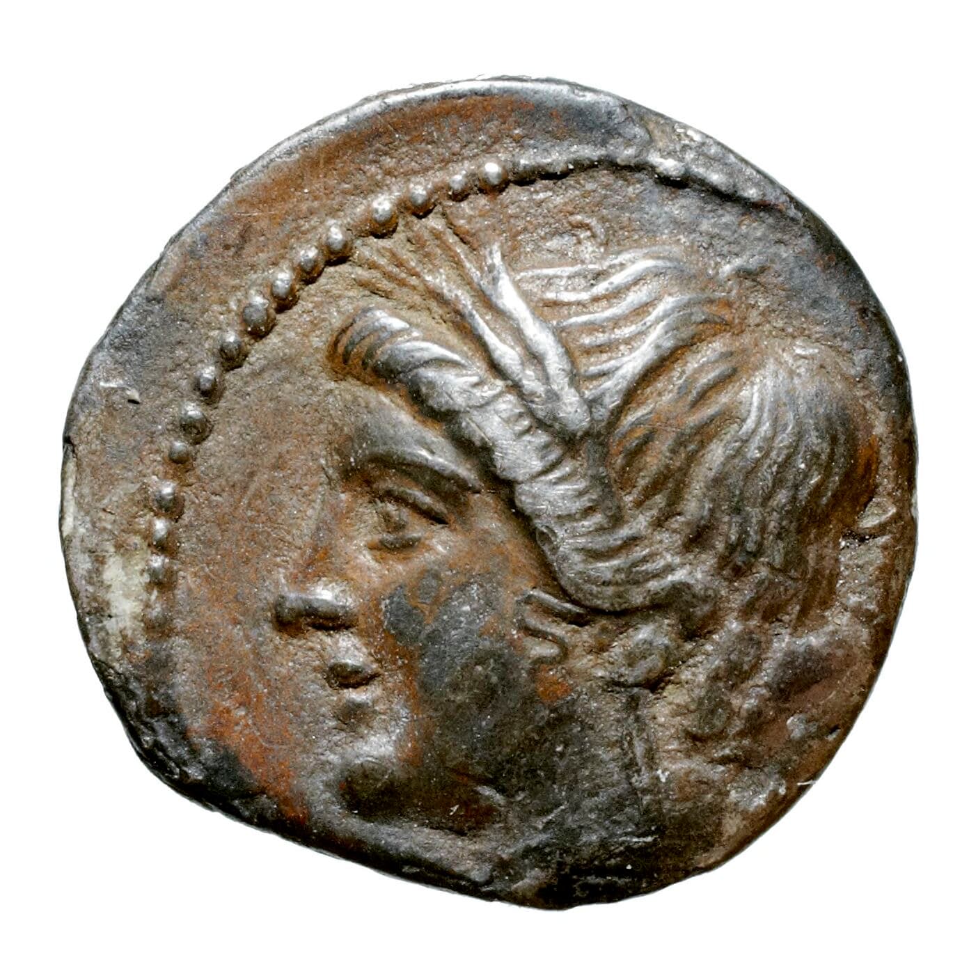 Both faces of a small worn silver coin, one side bearing a male head in profile, the other a standing horse